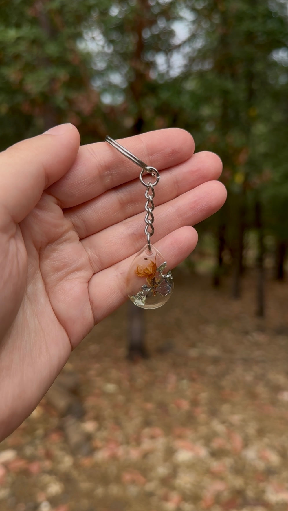 Golden Rosemary Resin Keychain – Oval Botanical Keepsake with Silver & Gold Flakes