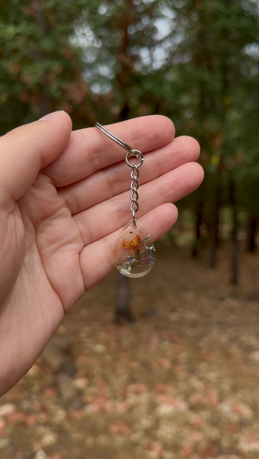 Golden Rosemary Resin Keychain – Oval Botanical Keepsake with Silver & Gold Flakes
