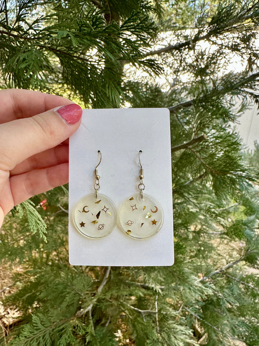 Round celestial resin earrings, moons, planets, and stars